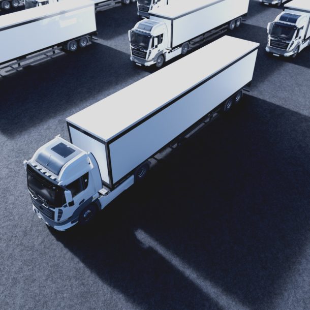 Fleet of new heavy trucks. Transportation, shipping industry