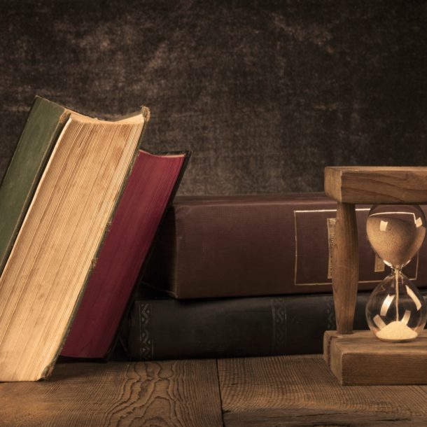 Old Books With Hourglass