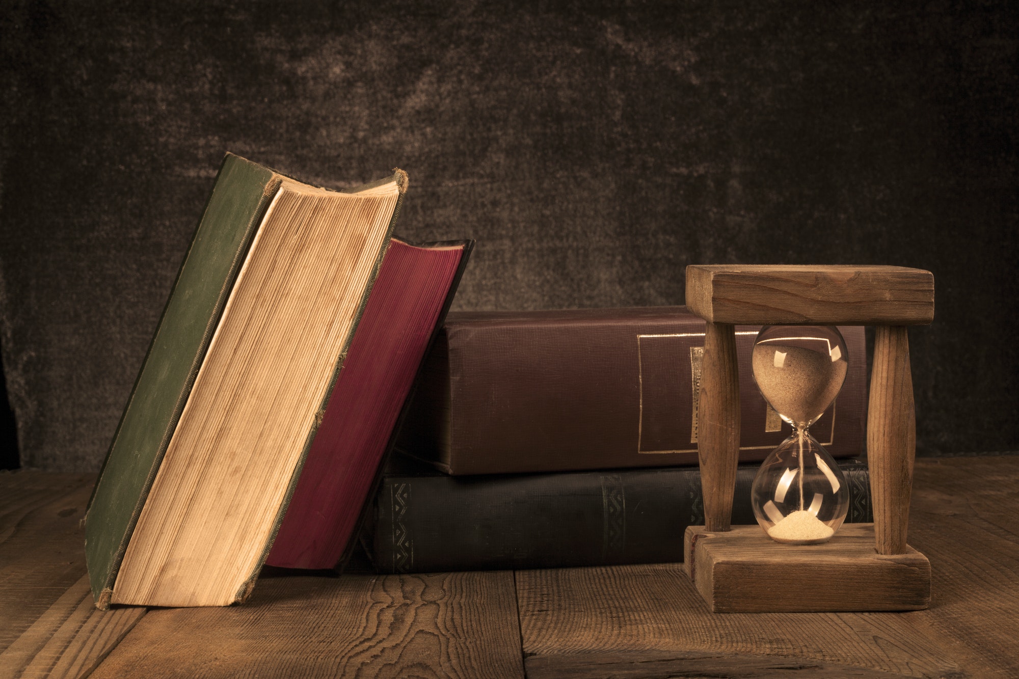 Old Books With Hourglass