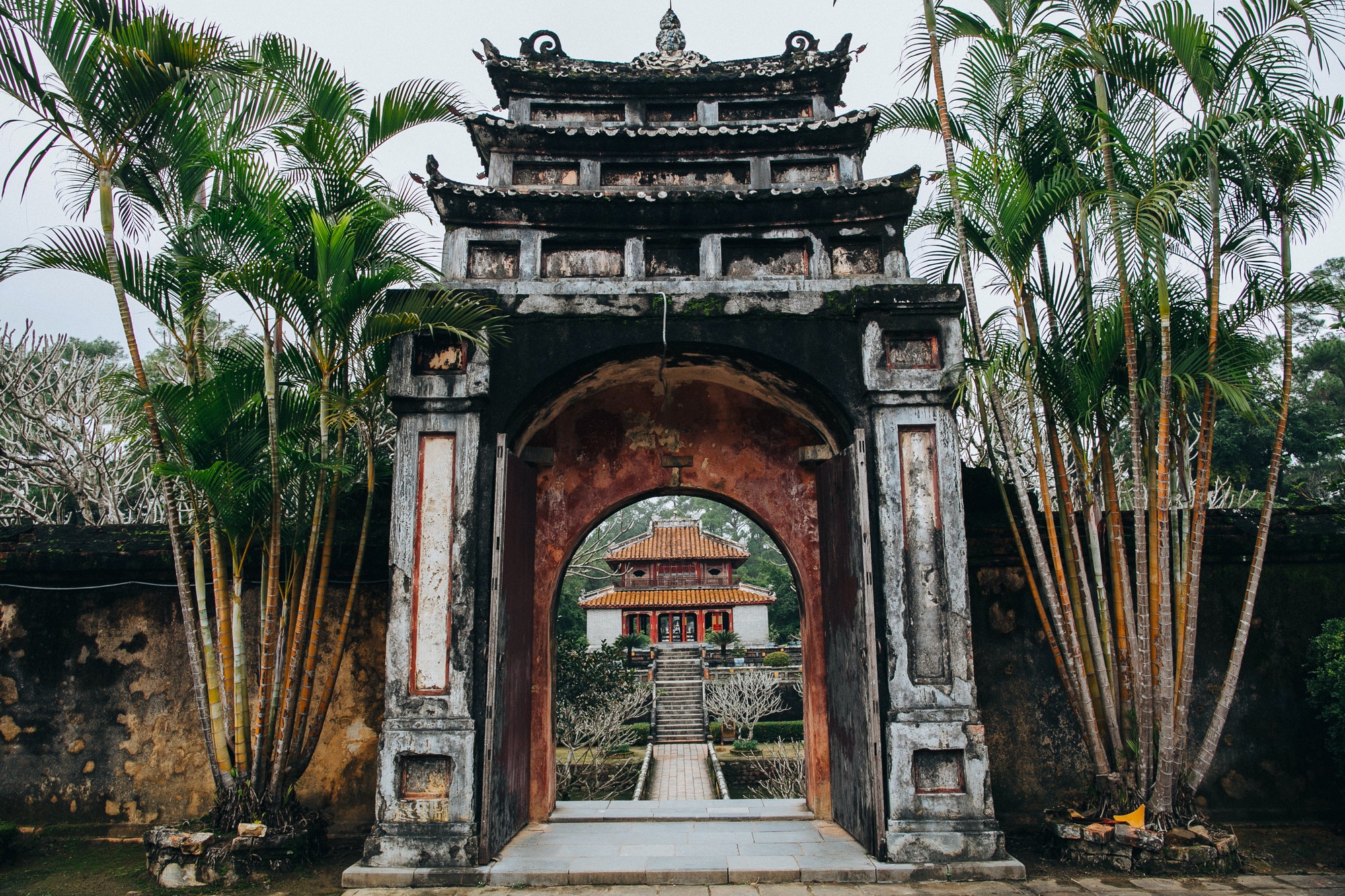 entrance to the beautiful oriental park with traditional ancient architecture in Hue, Vietnam