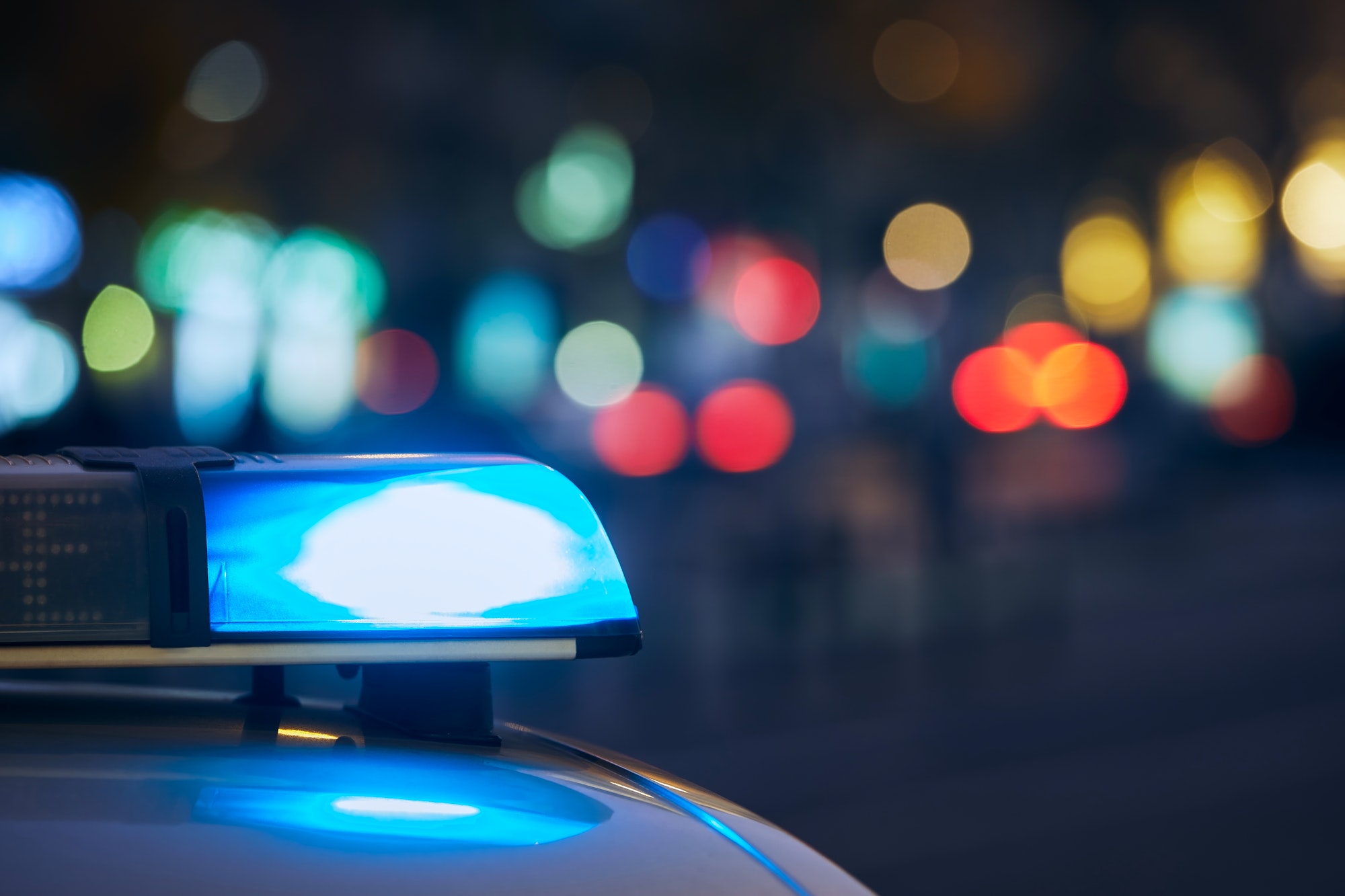 Blue flasher light of siren of police car