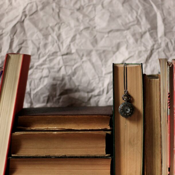 Old books and pocket watch