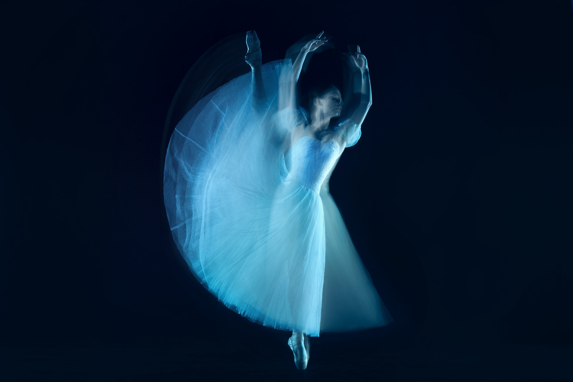 photo as art - a sensual and emotional dance of beautiful ballerina through the veil