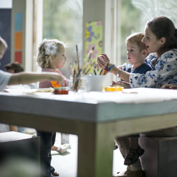 Teacher and children drawing