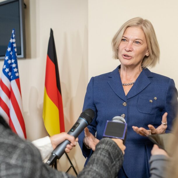 Contemporary female politician giving interview at press conference