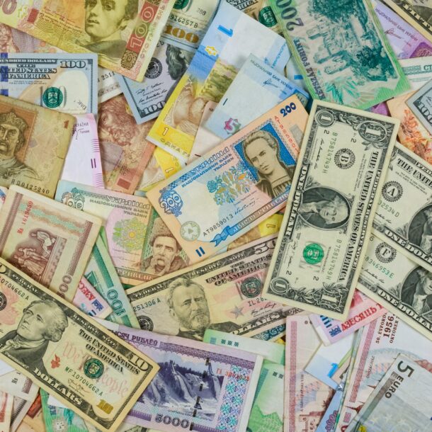 International currencies banknotes from different countries overlapping each other